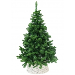 A lush green artificial Christmas tree in a white woven basket.