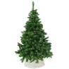 A lush green artificial Christmas tree adorned with warm white lights in a woven basket.