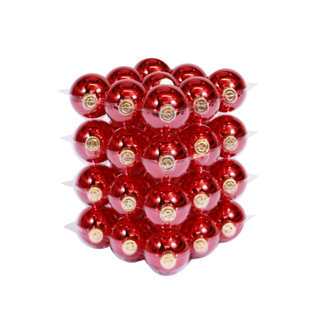 A stacked arrangement of shiny red ornaments with golden caps, reflecting light beautifully. A stacked arrangement of shiny red ornaments with golden caps, reflecting light beautifully.
