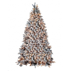 A snowy, frosted Christmas tree with lush green branches and warm light accents.