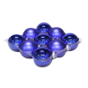 A cluster of glossy blue spheres arranged in a tray, reflecting light elegantly.