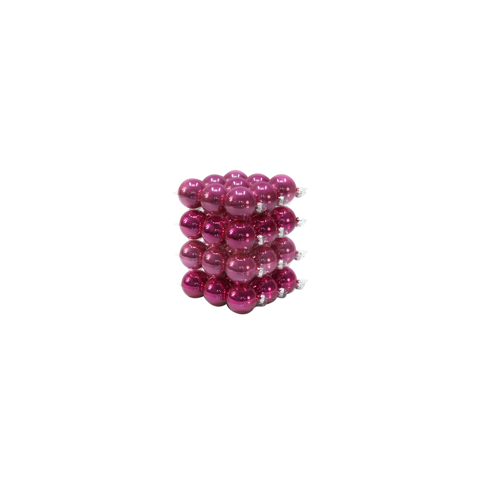 A vibrant stack of shiny magenta ornaments arranged in a neat, layered formation.