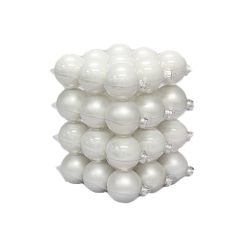 Stacked glossy white spheres forming a cube-like structure with a smooth, reflective surface.
