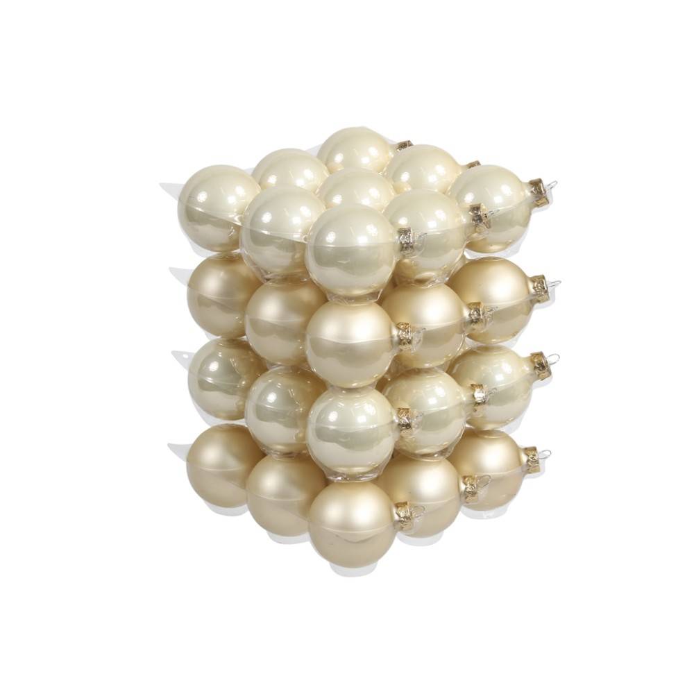 A cluster of shiny cream-colored ornaments arranged in a layered pattern.