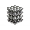 A stack of shiny silver and gray decorative balls with a smooth, reflective surface.