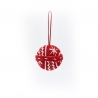 A red knitted ornament with white snowflake patterns, hanging by a red string.