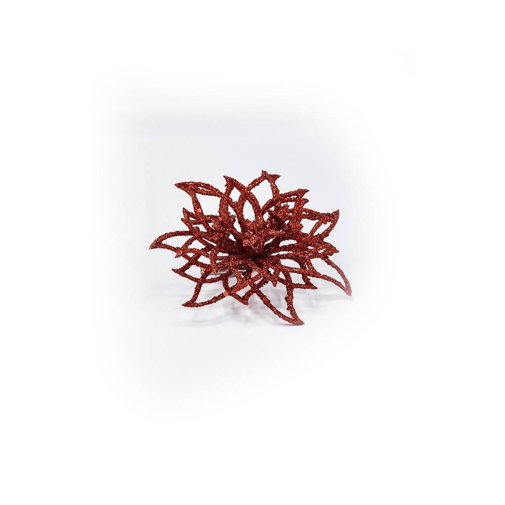 A sparkling red, intricately layered flower shape with shimmering details.