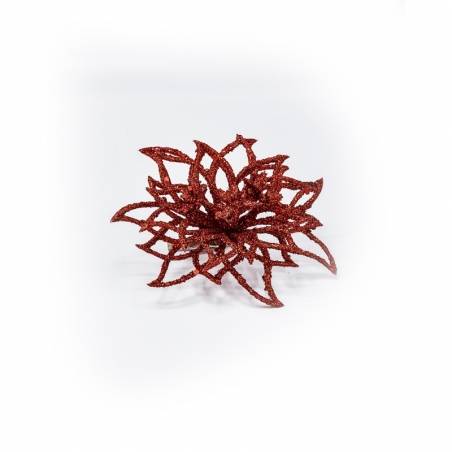 A sparkling red, intricately layered flower shape with shimmering details.