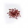 A sparkling red, intricately layered flower shape with shimmering details.
