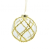 A clear glass ornament adorned with golden glitter in a crisscross pattern.