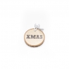 A circular wooden tag with "XMAS" engraved, tied with a white string.