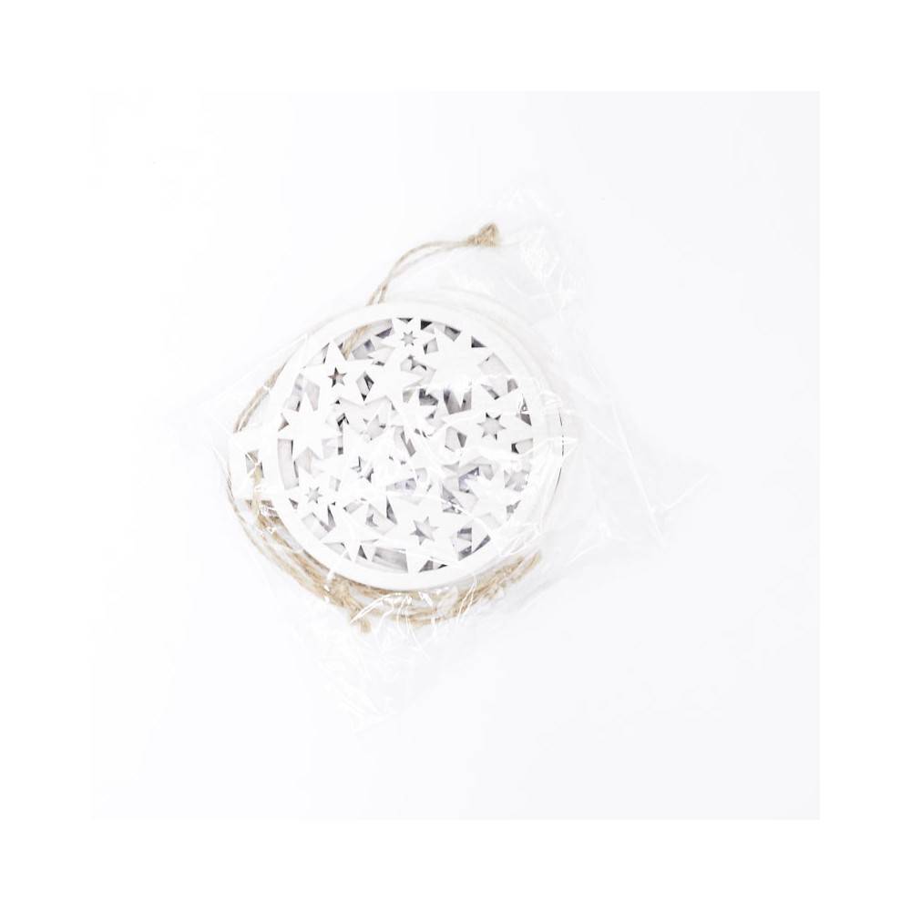 A circular white decoration with intricate star cutouts, packaged with twine.