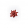 A shimmering red flower with glittery petals, set against a plain white background.