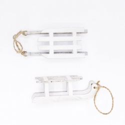 Two wooden sleighs in white, one larger and one smaller, with twine handles.