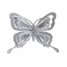A shimmering silver butterfly with intricate, glittery wings.