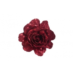 A sparkling red rose made of glitter, showcasing layered petals with a vibrant shine.