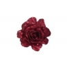 A sparkling red rose made of glitter, showcasing layered petals with a vibrant shine.
