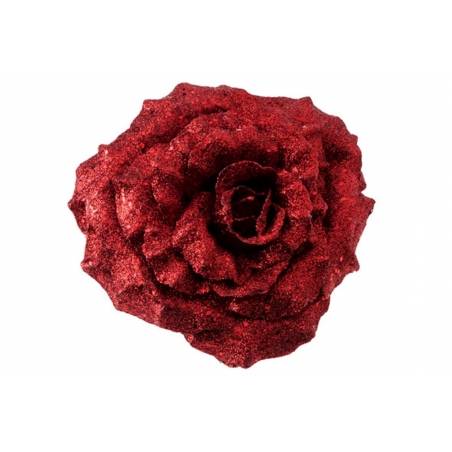 A vibrant red rose covered in shimmering glitter, showcasing its intricate petal details.