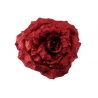 A vibrant red rose covered in shimmering glitter, showcasing its intricate petal details.