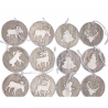 Wooden ornaments featuring festive silhouettes of animals and trees in a rustic style.
