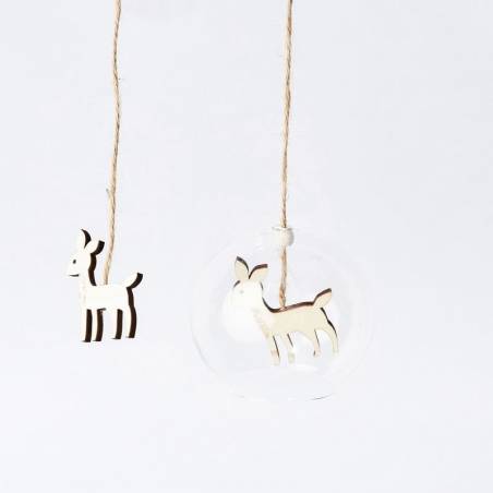 Two wooden deer ornaments, one inside a clear glass sphere, hanging on twine against a white back...