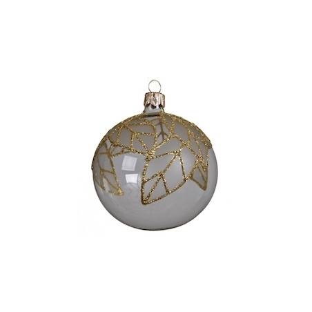 A round glass ornament in white with delicate gold leaf patterns.