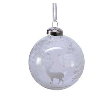 A clear, frosted glass ornament with a silver deer silhouette and snowy trees design.