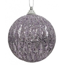 A shimmering purple ornament covered in sparkling glitter, reflecting light beautifully.
