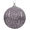 A shimmering purple ornament covered in sparkling glitter, reflecting light beautifully.