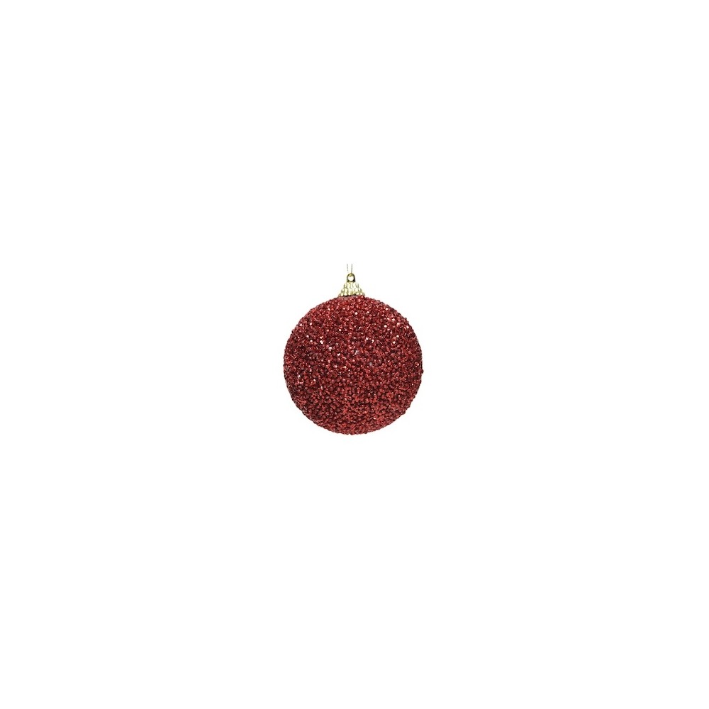 A shiny red ornament covered in glitter, round with a gold top for hanging.