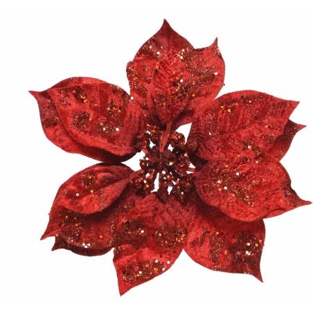 A vibrant red poinsettia with glittering leaves and a textured surface.