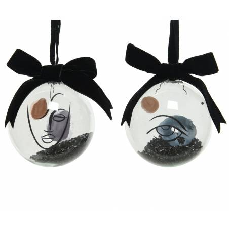 Two glass ornaments with abstract face designs, featuring black and earthy tones and velvet bows. Two glass ornaments with abstract face designs, featuring black and earthy tones and velvet bows.