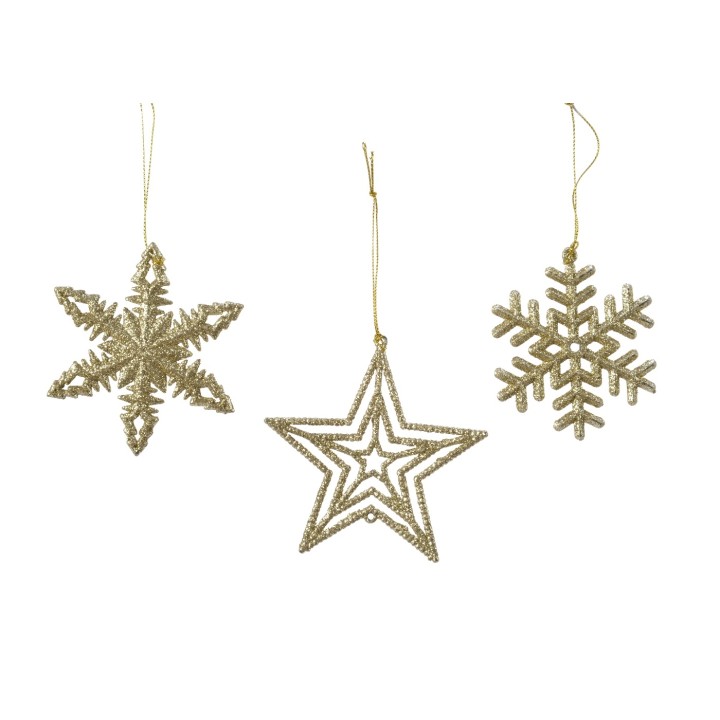 Three glittering gold ornaments: a snowflake, a star, and a decorative snowflake shape.