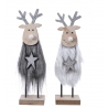 Two whimsical reindeer figures with fuzzy bodies, wooden faces, and sparkling antlers.