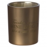 A shiny gold candle holder with an engraved inspirational quote.