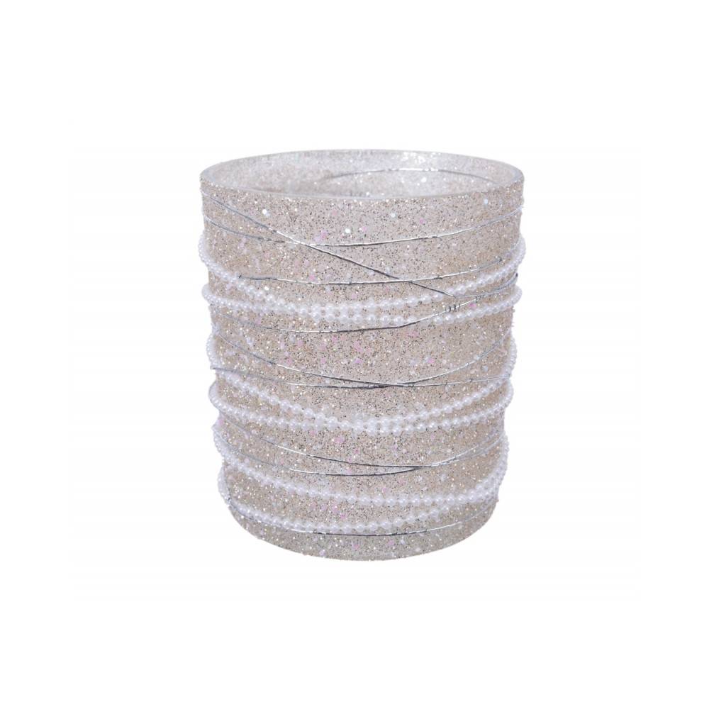 A stack of shimmering, clear, glittery ribbons with a textured, sparkly surface.