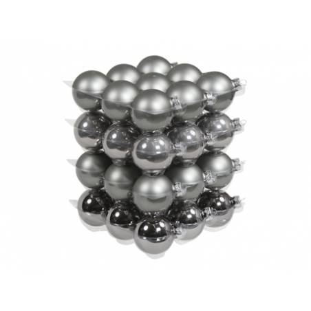 A stacked arrangement of shiny silver and matte gray ornaments in a geometric formation. A stacked arrangement of shiny silver and matte gray ornaments in a geometric formation.