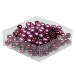 A clear box filled with shiny purple and burgundy decorative beads.