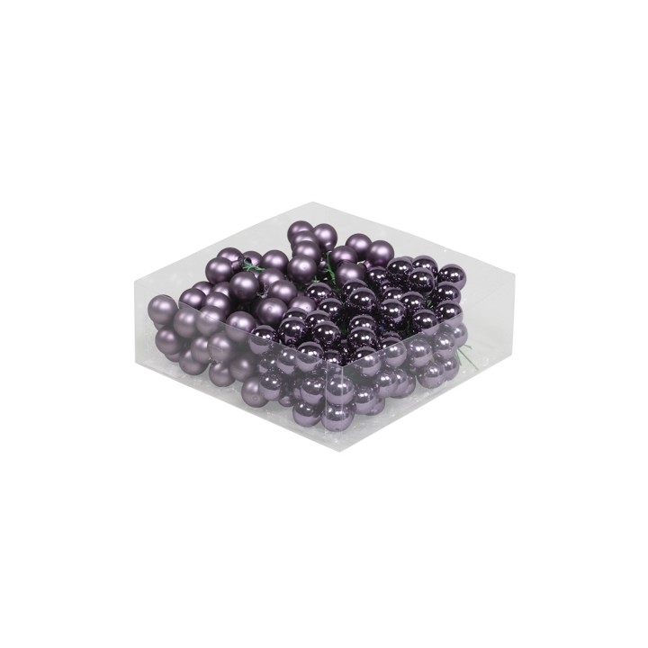 A cluster of glossy, deep purple spherical ornaments in a transparent box.