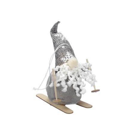 A whimsical gnome on skis, with a fluffy white beard and a silver-patterned hat.