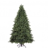 A lush, green artificial Christmas tree stands tall on a black metal base.