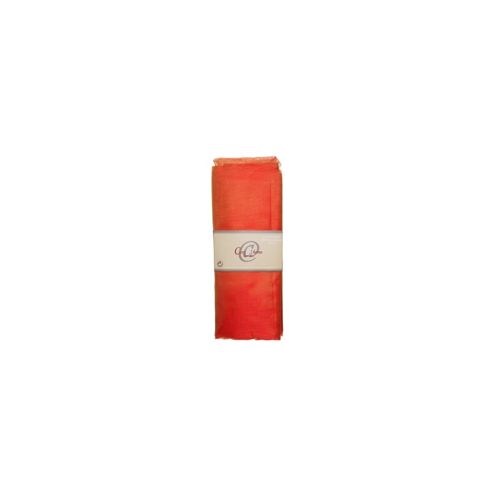 A vibrant orange scarf, elegantly folded with a simple white label.