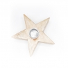 A wooden star-shaped candle holder with a shiny metal cup in the center.