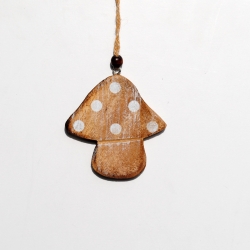 A rustic wooden mushroom ornament with white polka dots and a natural twine hanger.
