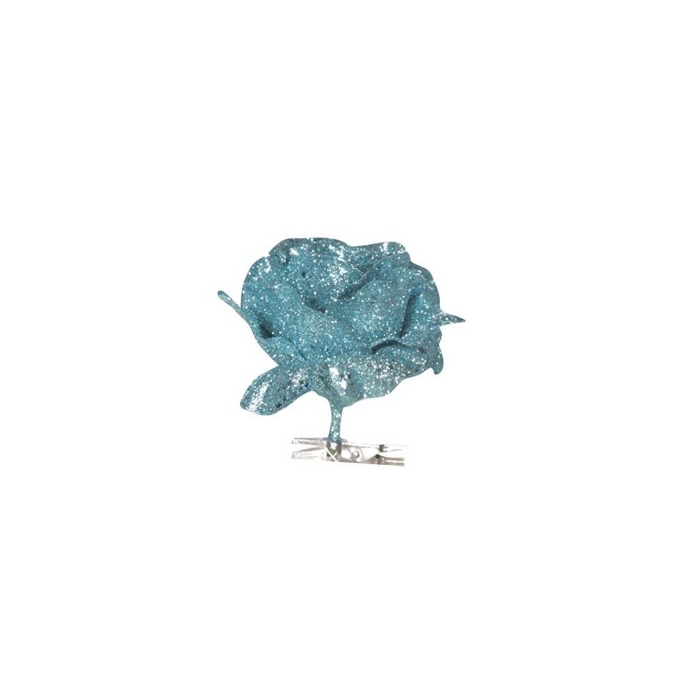 A shimmering blue rose made of glitter with delicate petals and a silver clip.