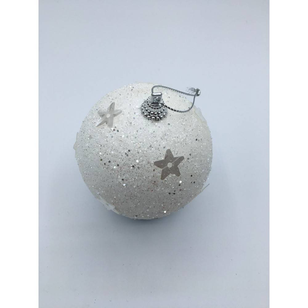 A shimmering white ornament adorned with silver stars and sparkling glitter.