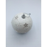 A shimmering white ornament adorned with silver stars and sparkling glitter.