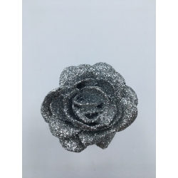 A sparkling silver rose with glittery petals, showcasing a delicate and elegant design.