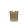 A glass candle holder with a gold star pattern and a shiny gold rim.