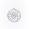 A delicate, shimmering silver ornament with intricate lace-like patterns.
